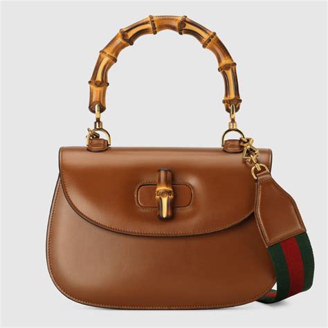 brown gucci bag with bamboo handle